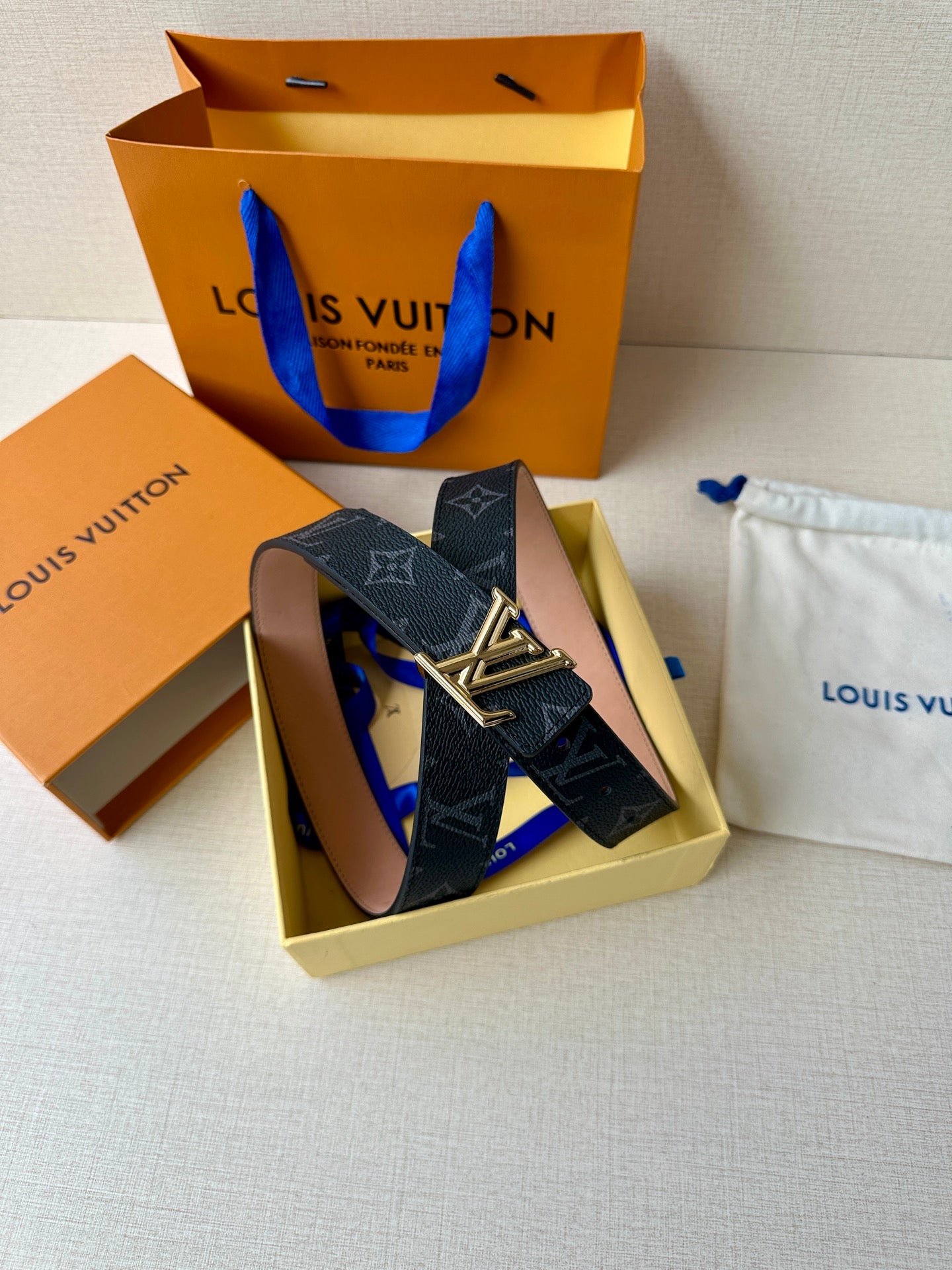 Louis Vuitton belt in box with dust bag, monogram strap and LV buckle