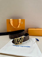 Louis Vuitton monogram belt with LV gold buckle, coiled dark brown strap