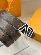 Louis Vuitton monogram belt with LV silver buckle on dark brown leather