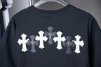 Black short-sleeve T-shirt with row of white cross graphics on the back