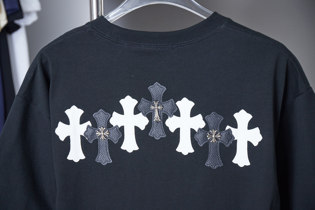 Black short-sleeve T-shirt with row of white cross graphics on the back