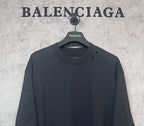 Balenciaga dark crew-neck T-shirt close-up