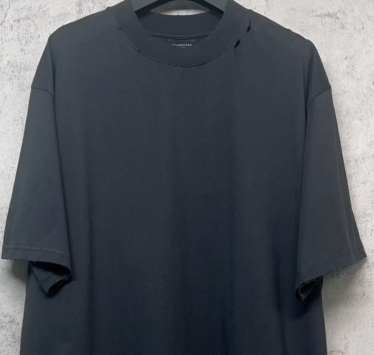 Balenciaga dark crew-neck T-shirt with short sleeves and cuffs