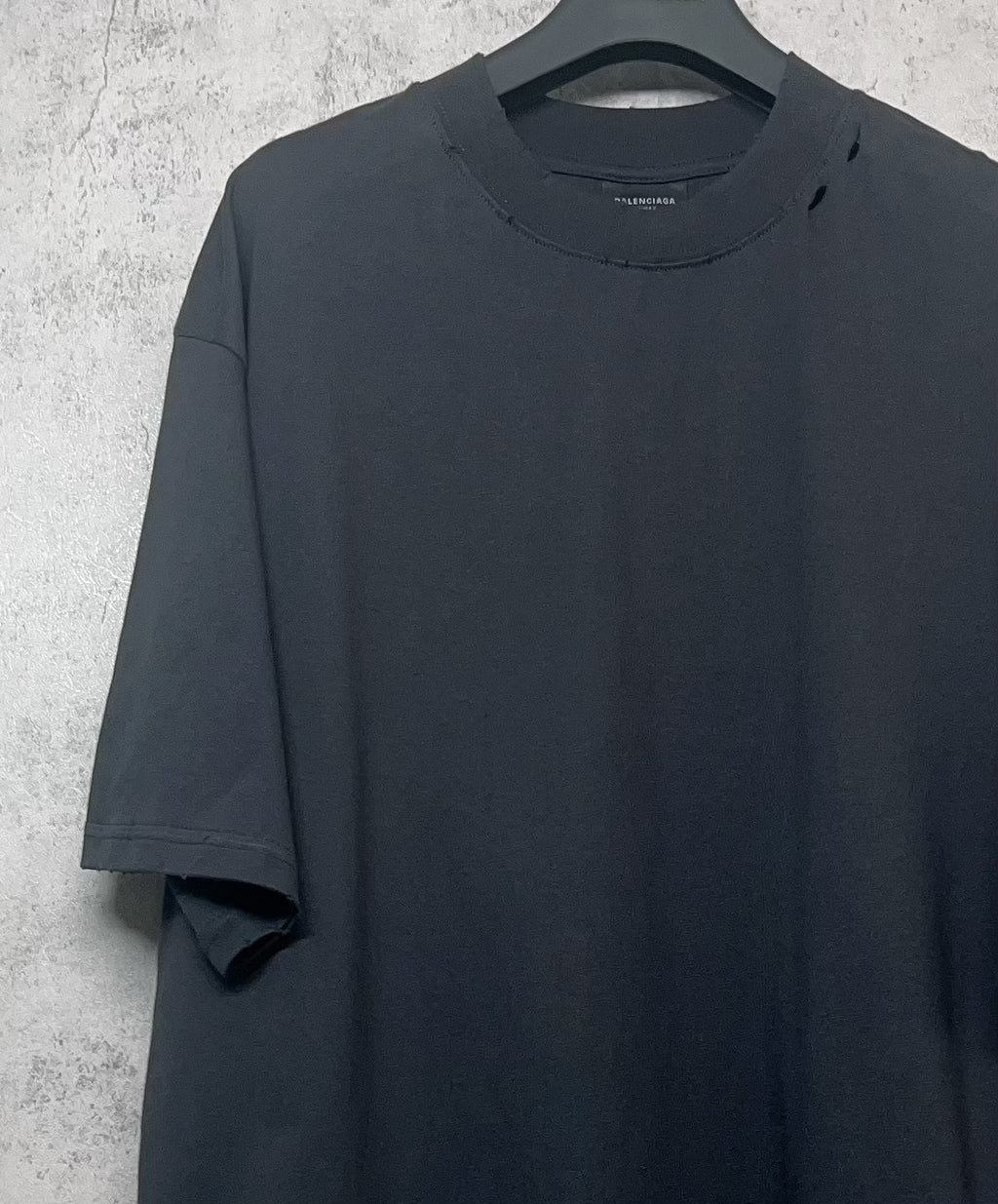 Balenciaga dark T-shirt front with crew neck and short sleeves