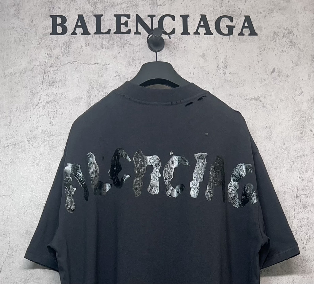 Balenciaga dark T-shirt with animal-style graphic across the back