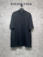 Balenciaga dark T-shirt with loose fit, short sleeves, side slits