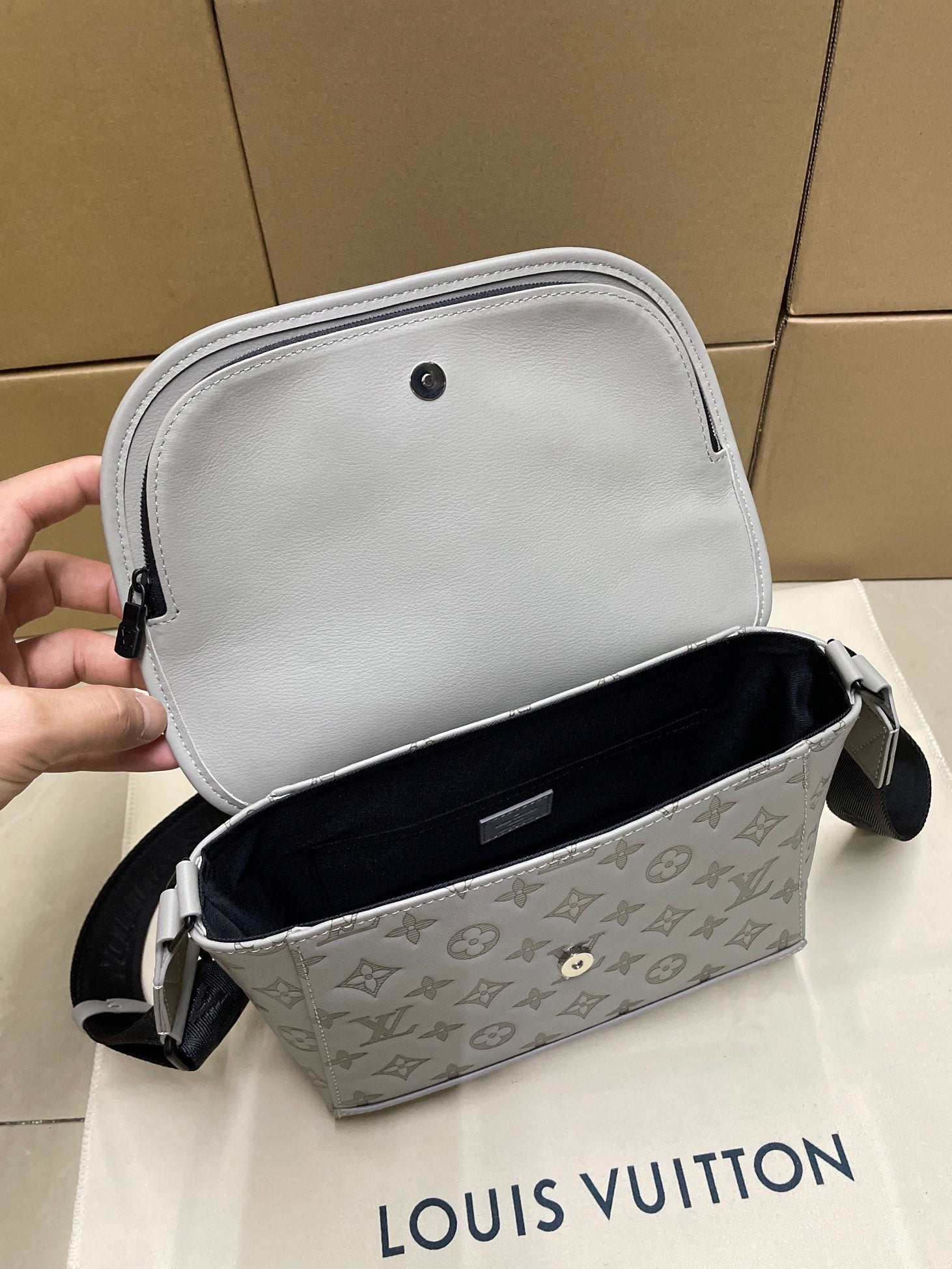 Louis Vuitton men’s crossbody bag, light front panel with dark interior
