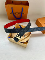 Navy monogram leather belt with gold LV buckle, red lining visible