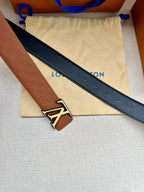 Louis Vuitton belt with dark navy strap, embossed leather edge, gold-tone LV buckle