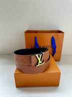 Louis Vuitton embossed tan leather belt with gold-tone LV buckle