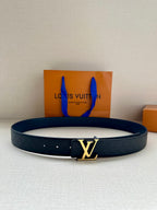Louis Vuitton belt in dark blue with embossed pattern and gold LV buckle