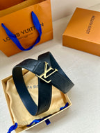 Louis Vuitton belt on pouch: dark blue embossed strap with gold LV buckle