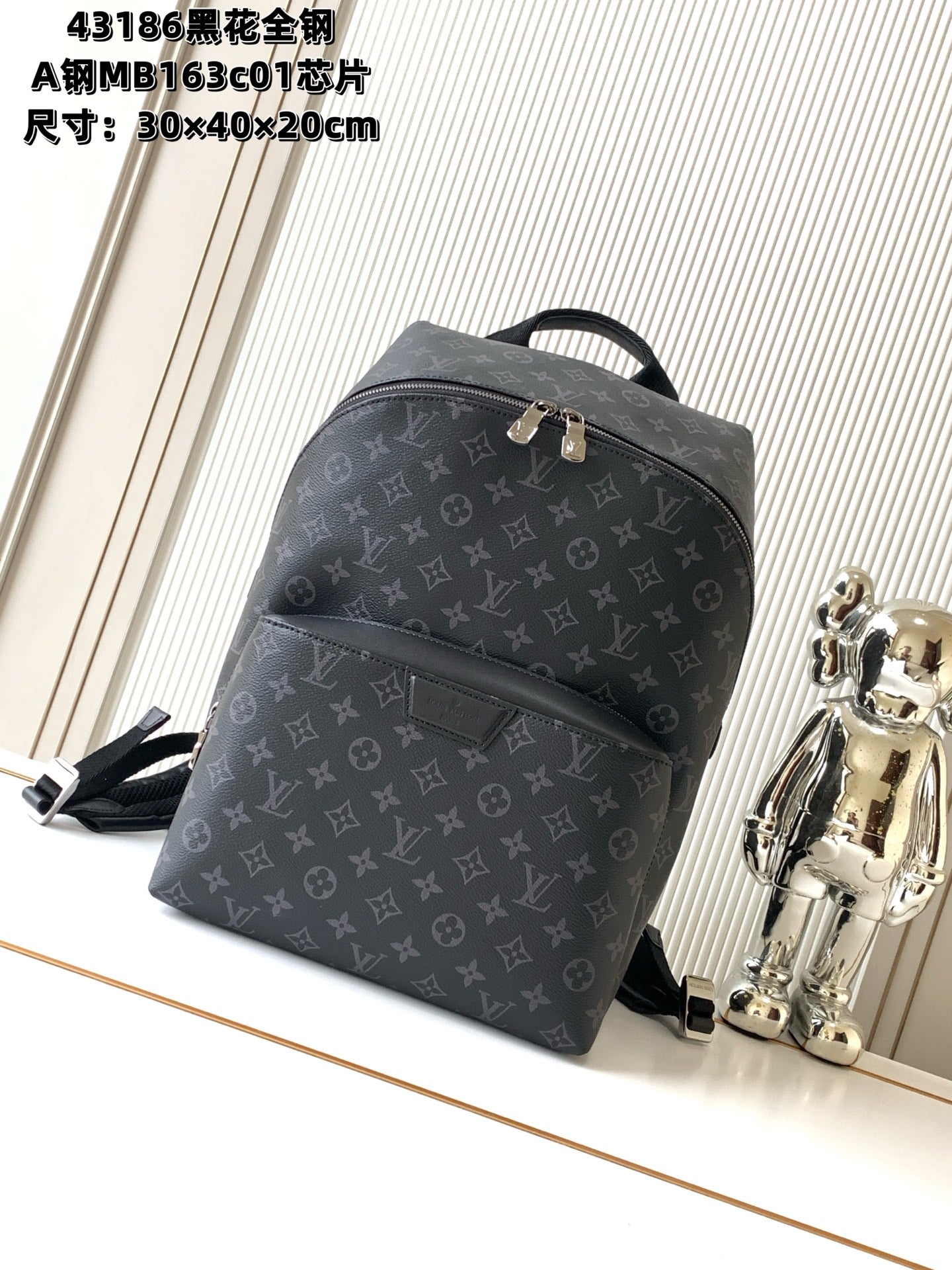 Men's designer monogram backpack with top handle and front zipper pocket