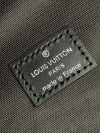 Louis Vuitton made in France label on dark monogram backpack