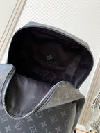 Men's monogram backpack open view with inner lining and zipper top