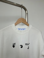 Off-white T-shirt with centered blue-and-black graphic and script lettering