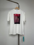 Off White T-shirt in off-white with red abstract square face graphic on chest
