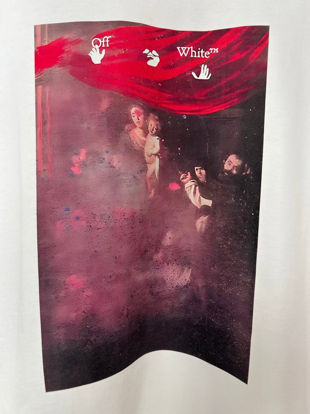 Off White T-shirt close-up of red, purple, and black graphic print on chest