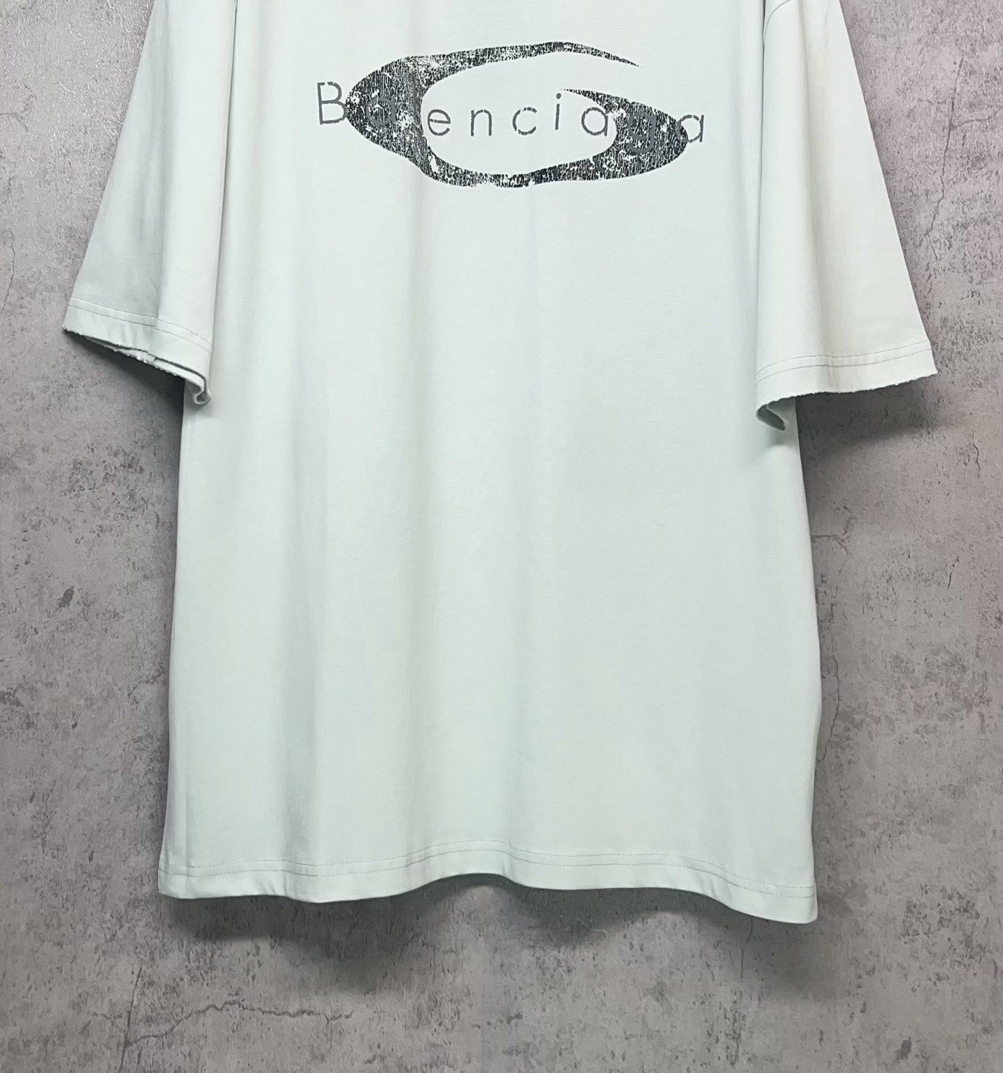 Balenciaga short-sleeve T-shirt in light mint with oval graphic logo print, lower front