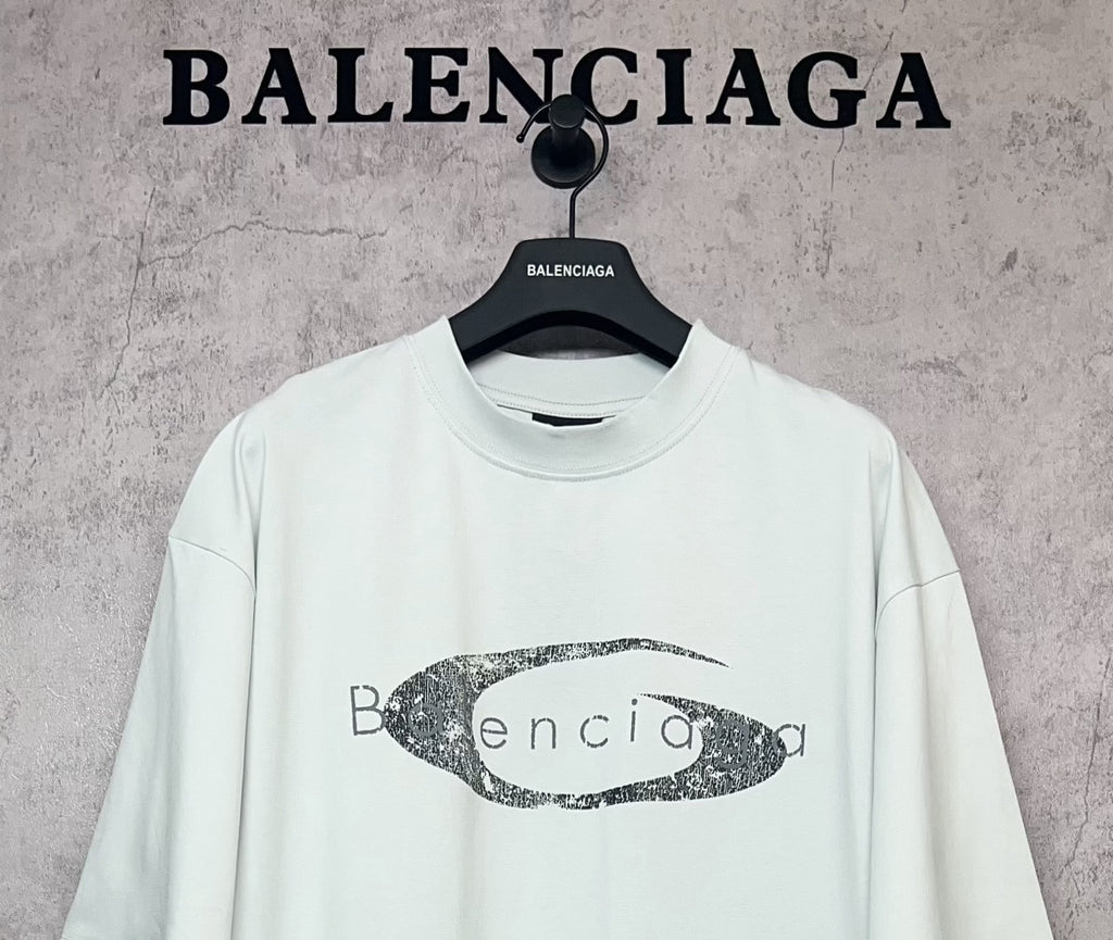 Balenciaga short-sleeve T-shirt in light mint with oval graphic logo print, front close-up
