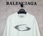 Balenciaga short-sleeve T-shirt in light mint with oval graphic logo print, front close-up