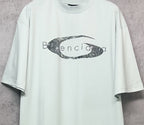 Balenciaga short-sleeve T-shirt in light mint with oval graphic logo print, front close-up