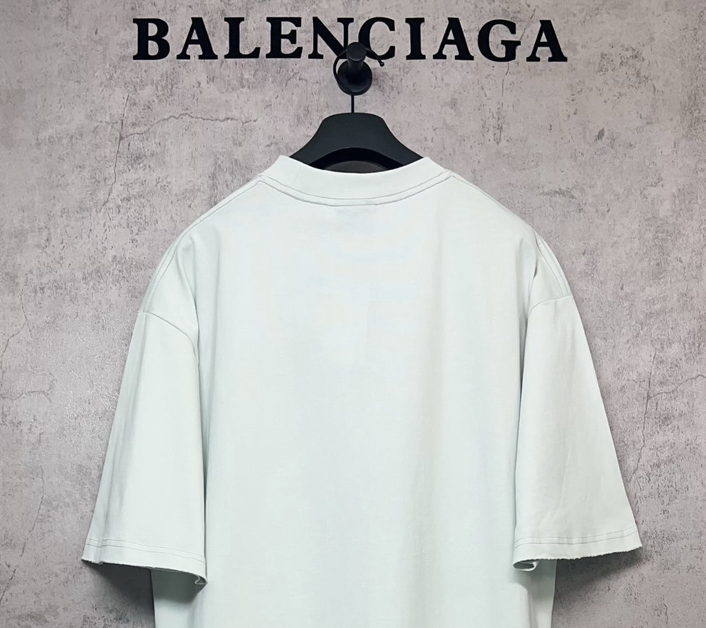 Balenciaga short-sleeve T-shirt in light mint, back view on hanger