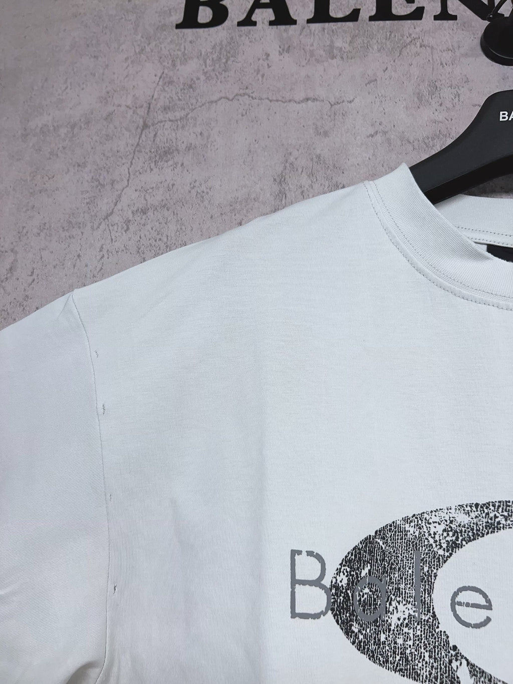 Balenciaga short-sleeve T-shirt in light mint with partial oval graphic logo print, side angle