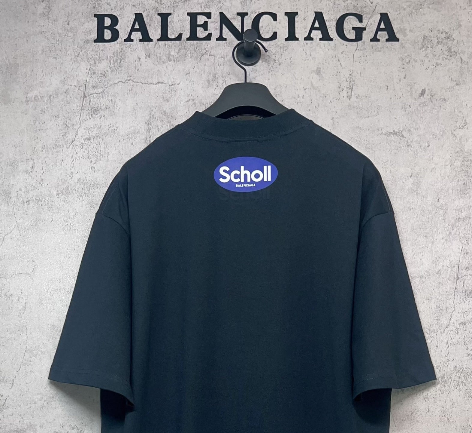 Balenciaga short-sleeve T-shirt, dark navy, back view with small “Scholl” print