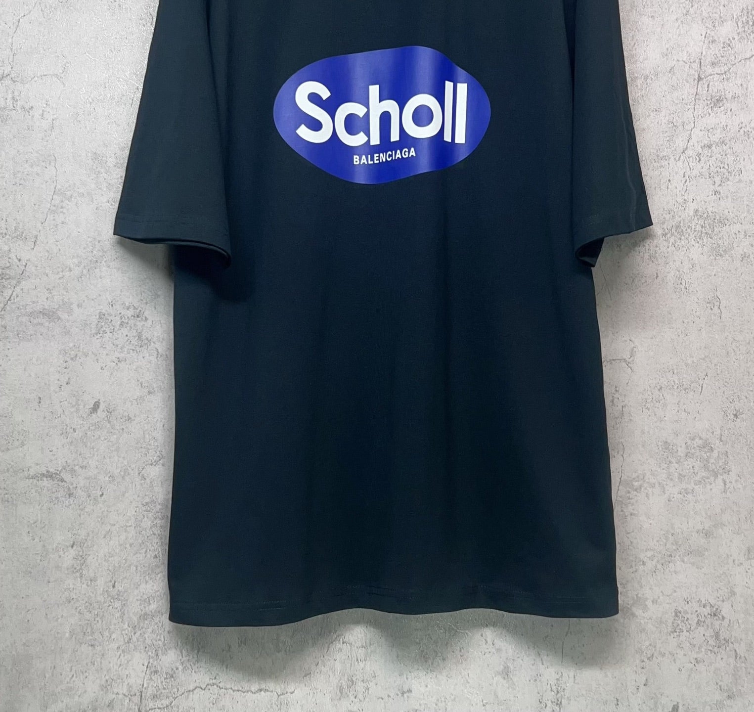 Balenciaga short-sleeve T-shirt, dark navy, centered “Scholl” logo on chest