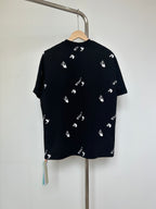 Black short-sleeve T-shirt, back view, with scattered white hand logos