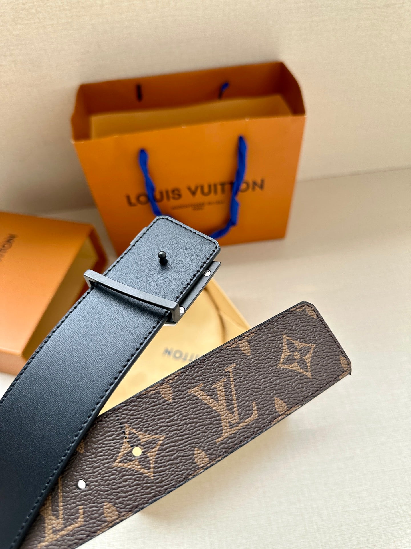 Louis Vuitton belt with square silver buckle on blue leather and dark monogram belt