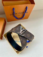 Louis Vuitton monogram belt in box, silver-toned buckle on dark brown leather