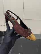 Women’s low-heel slingback flats, burgundy suede with gold toe panel, lace strap and bow.