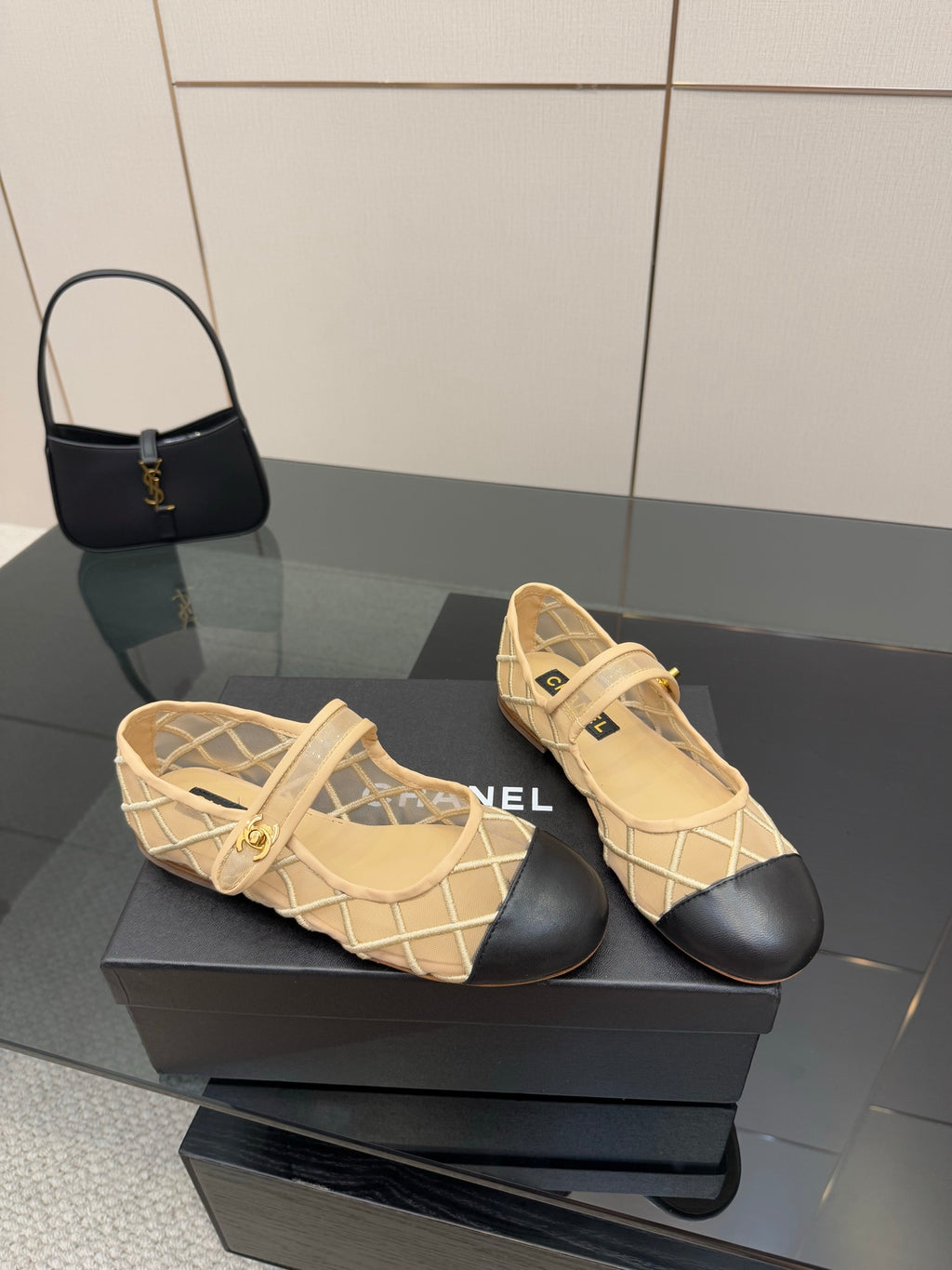 Chanel ladies woven-look flats in beige with black heel trim