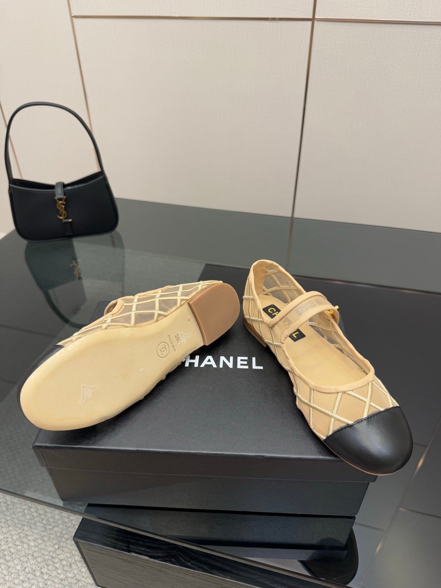 Chanel ladies flats with beige lattice upper; footbed and heel view