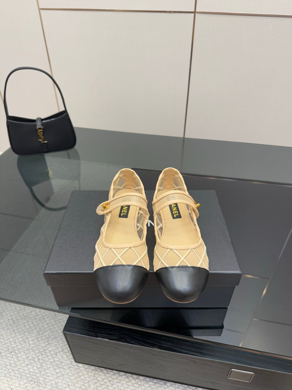 Chanel ladies flats with beige lattice upper and black toe trim