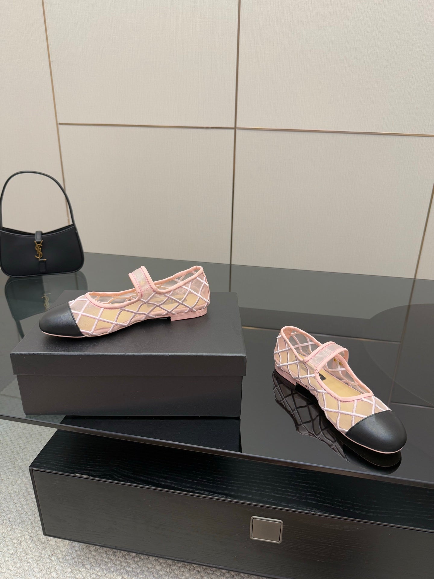 Pink lattice slingback flats with black heel sole