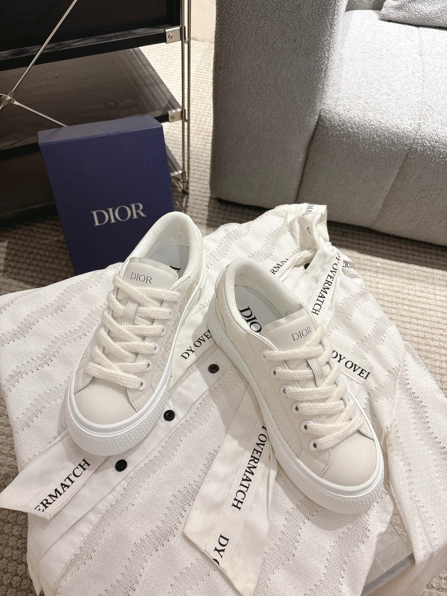 White Dior sneakers, lace-up with logo tongue detail and side branding