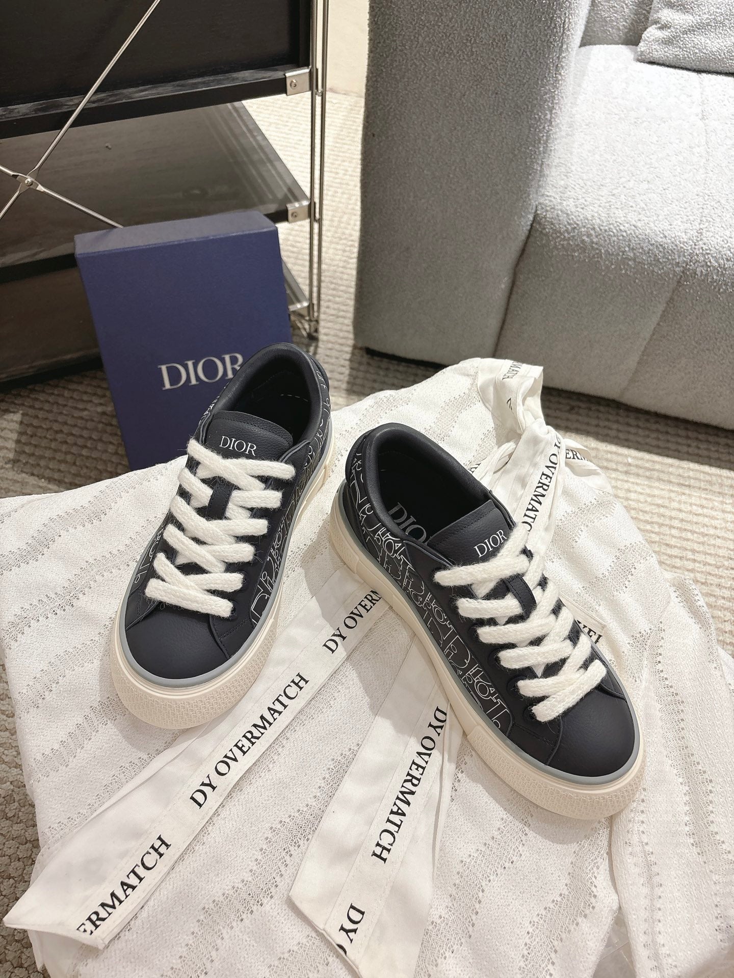 Dior unisex sneakers, black low-top, side logos and white lace-up detail