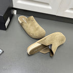 Taupe suede slide sandals with PRADA-branded insole and curved upper