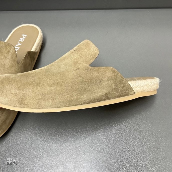 Taupe suede slide sandal with textured sole and PRADA footbed