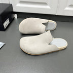 Prada light beige suede mules, closed-toe slip-on style with low profile sole