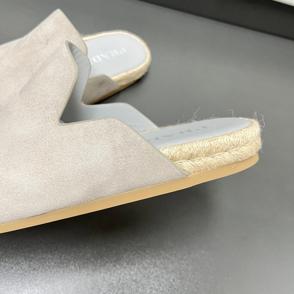 Prada light beige slip-on mule with jute-textured trim and thick sole edge