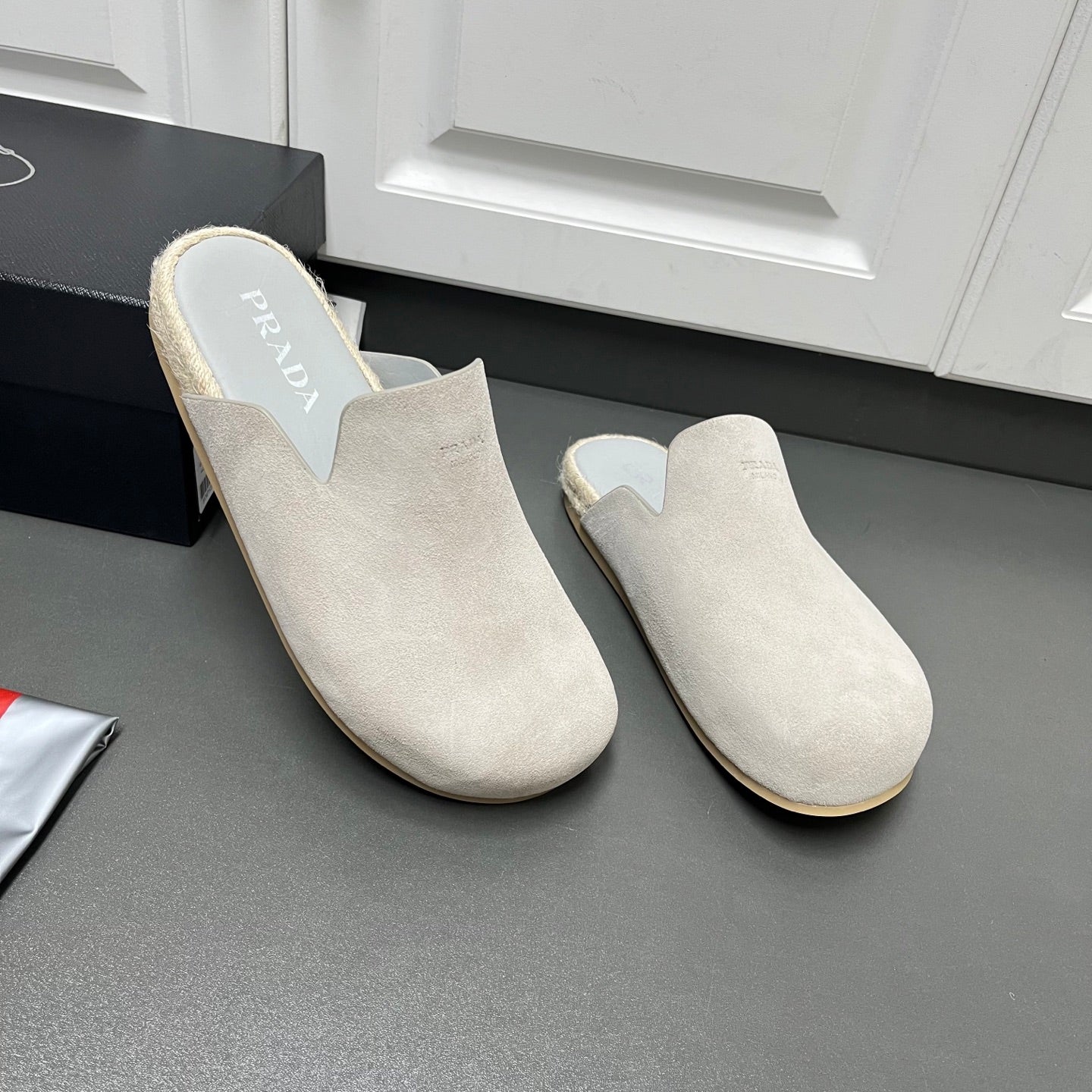 Prada light beige suede slip-on mules with low-profile sole and jute trim