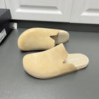 Prada suede mules with cutout instep, light tan upper and textured footbed