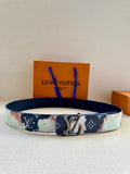 Louis Vuitton belt with blue-and-light monogram print and silver buckle, shown on surface