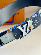Louis Vuitton belt close-up: brushed silver LV buckle on multicolor monogram strap
