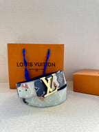 Louis Vuitton belt worn look: multicolor patchwork strap with gold LV buckle front