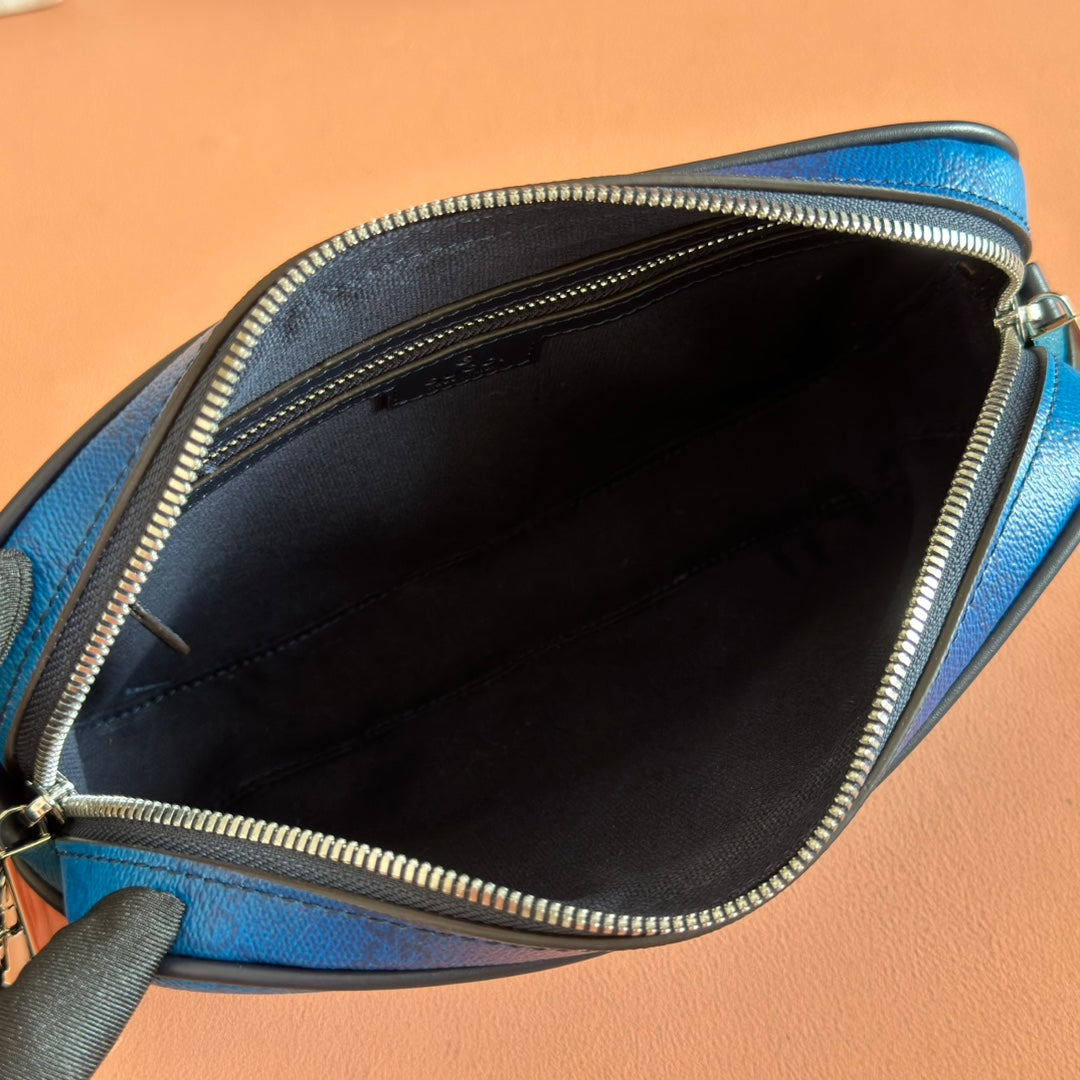 Gucci bag open top showing black interior lining and gold-tone zipper edge